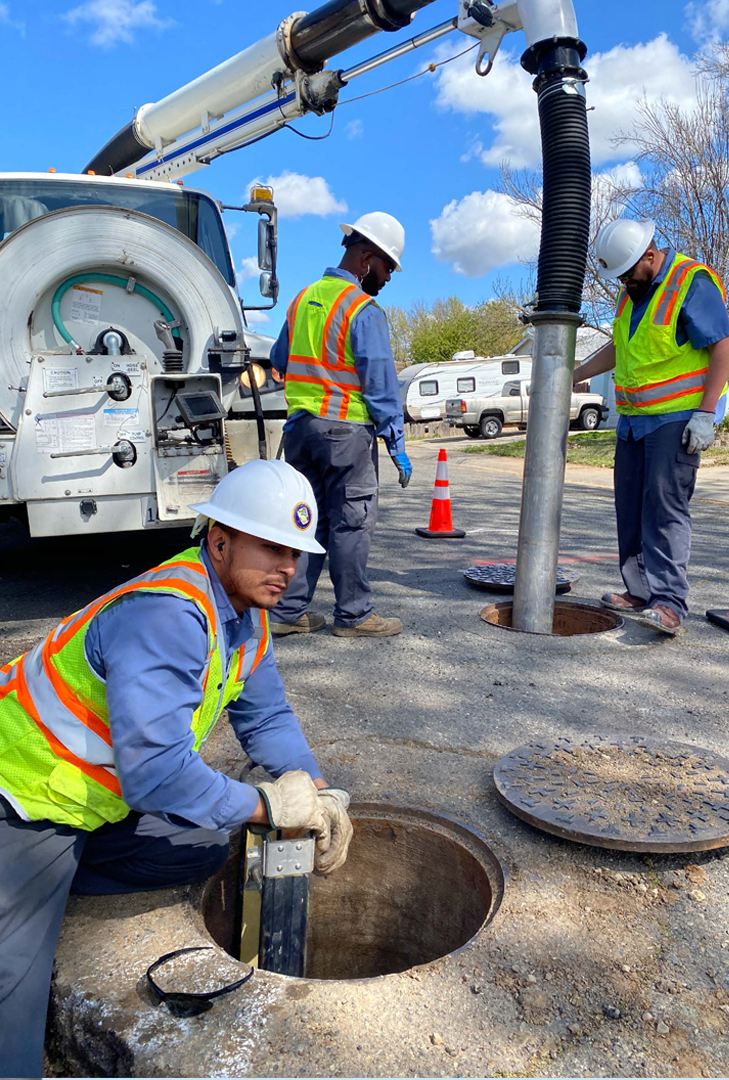 Drainage crews clearing clog