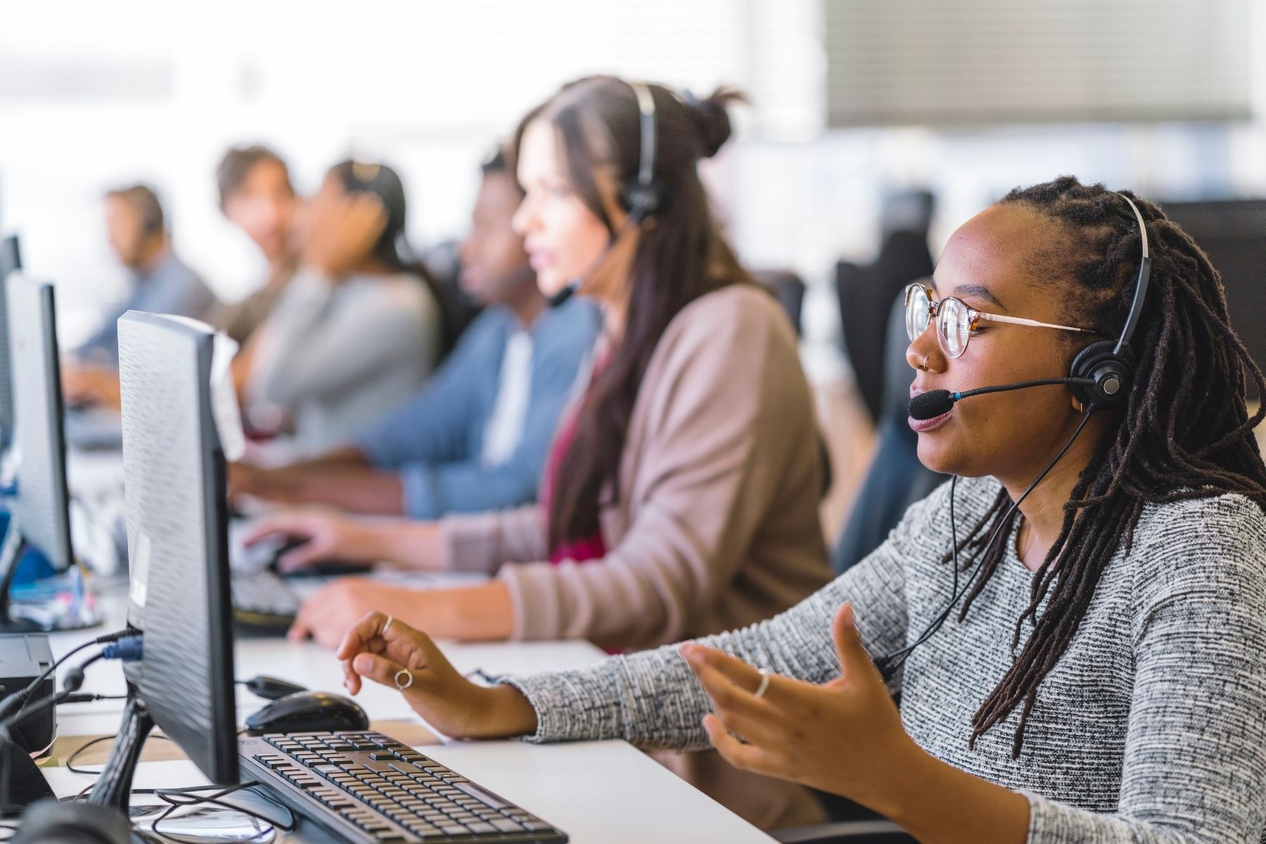 Customer service representatives taking calls