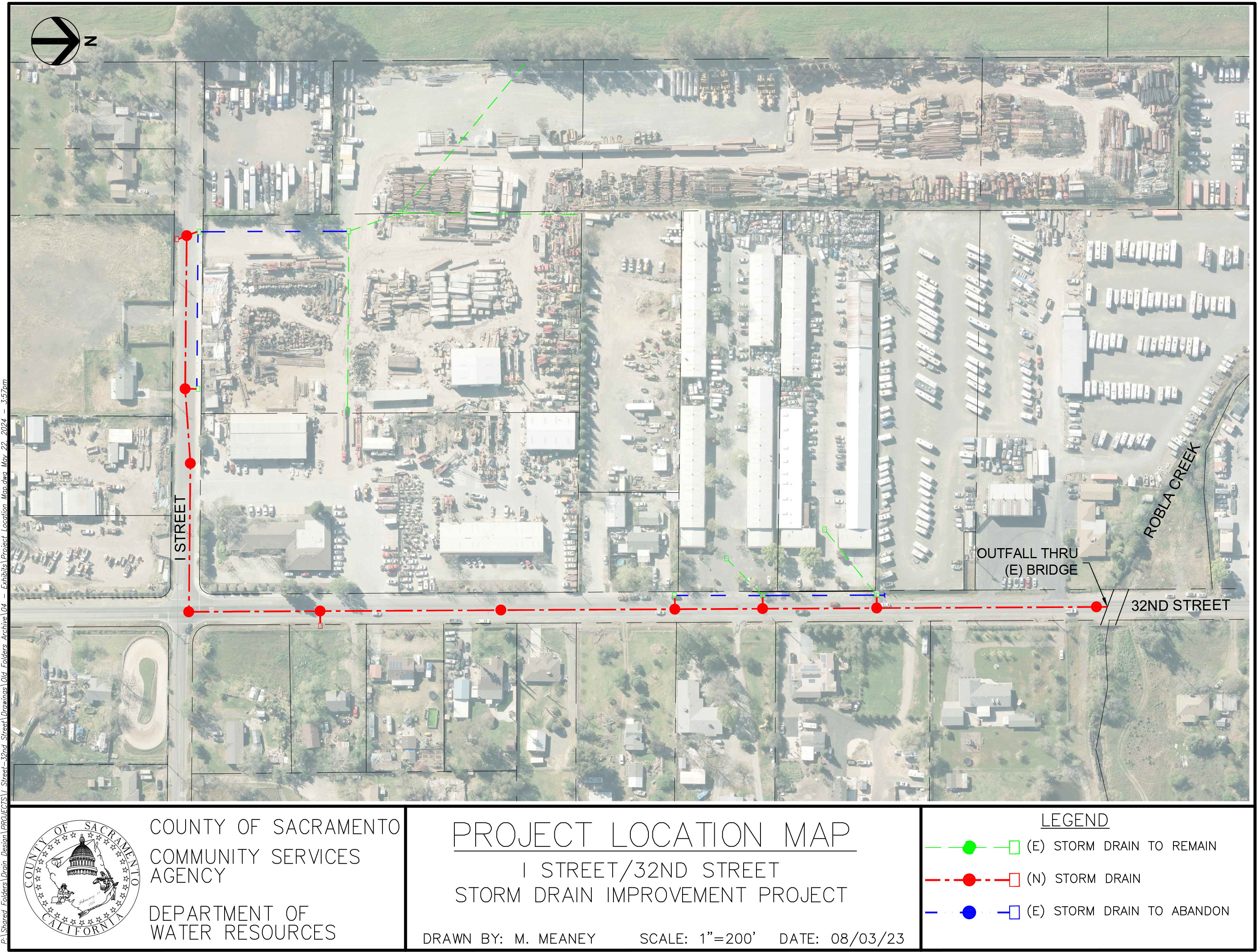 The I Street/32nd Street Storm Drain Improvement Project (Project) is located in the North Highlands area in the Robla Creek watershed.  The Project area is bound by low-density residential parcels east of 32nd Street, industrial land use west of 32nd Street and south of I Street, and McClellan airfield to the west.  The watershed area flows to Robla Creek from south to north via drainage ditches and overland sheet flow. The existing public drainage system for this area flows through a private industrial property within drainage easements.